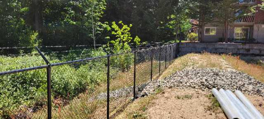 Black Chain link fence with Overhang