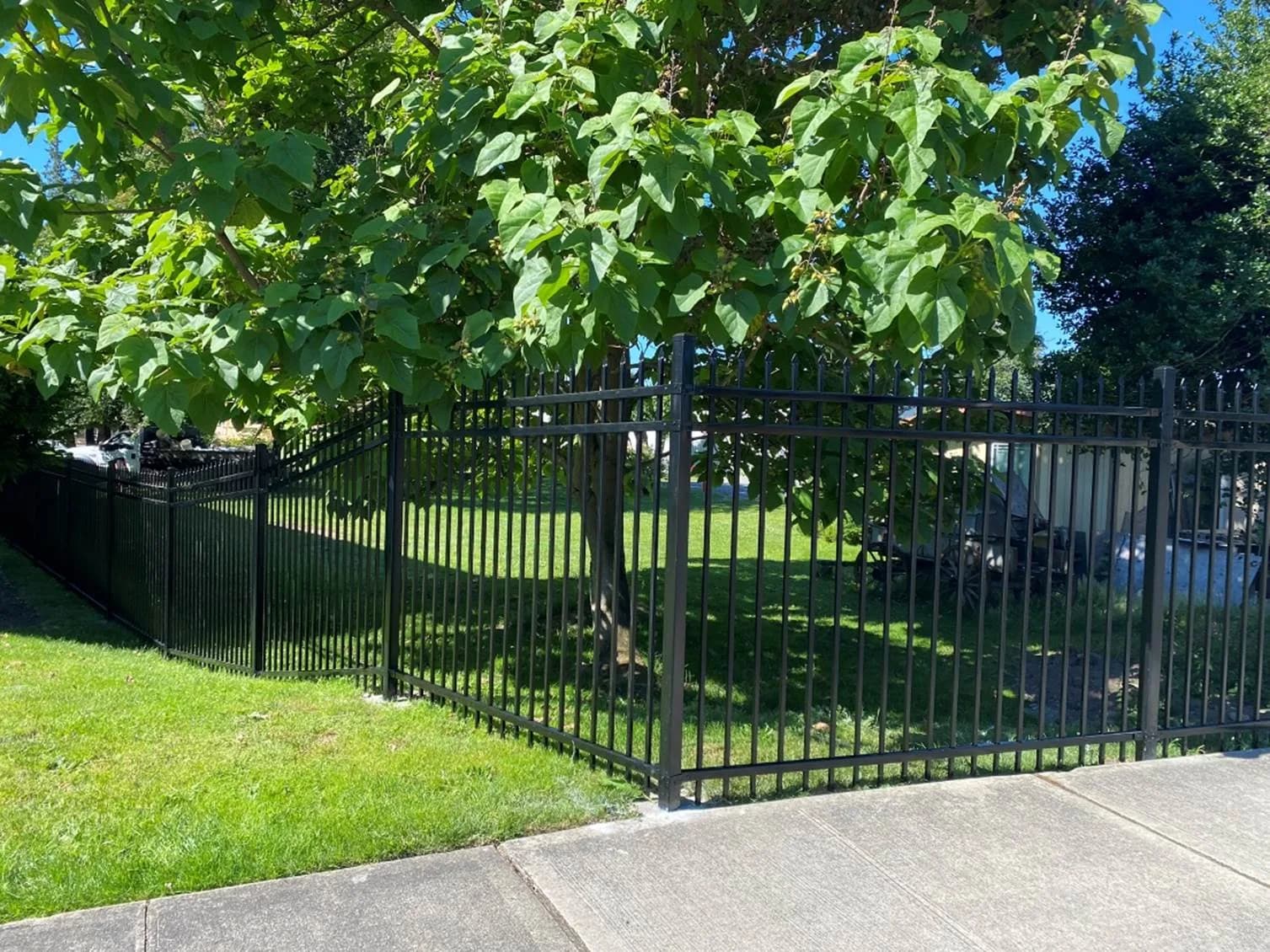 Commercial steel fence installation at Meeker Mansion