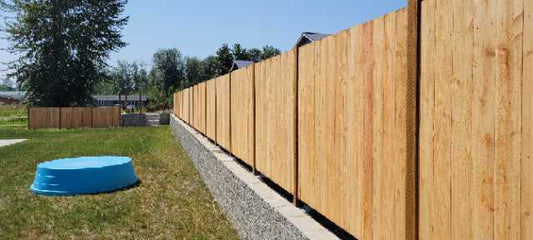 Wooden Fence on Retaining Wall